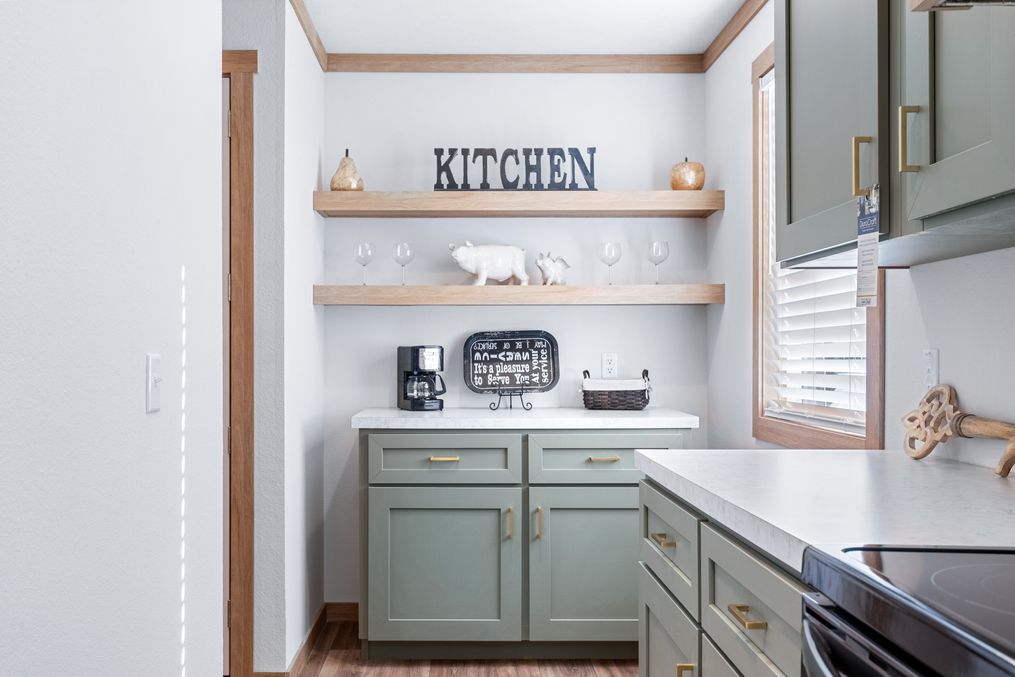 The TINSLEY Kitchen. This Manufactured Mobile Home features 4 bedrooms and 2 baths.