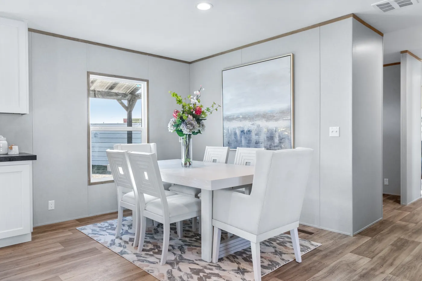 The ASPIRE Dining Area. This Manufactured Mobile Home features 3 bedrooms and 2 baths.