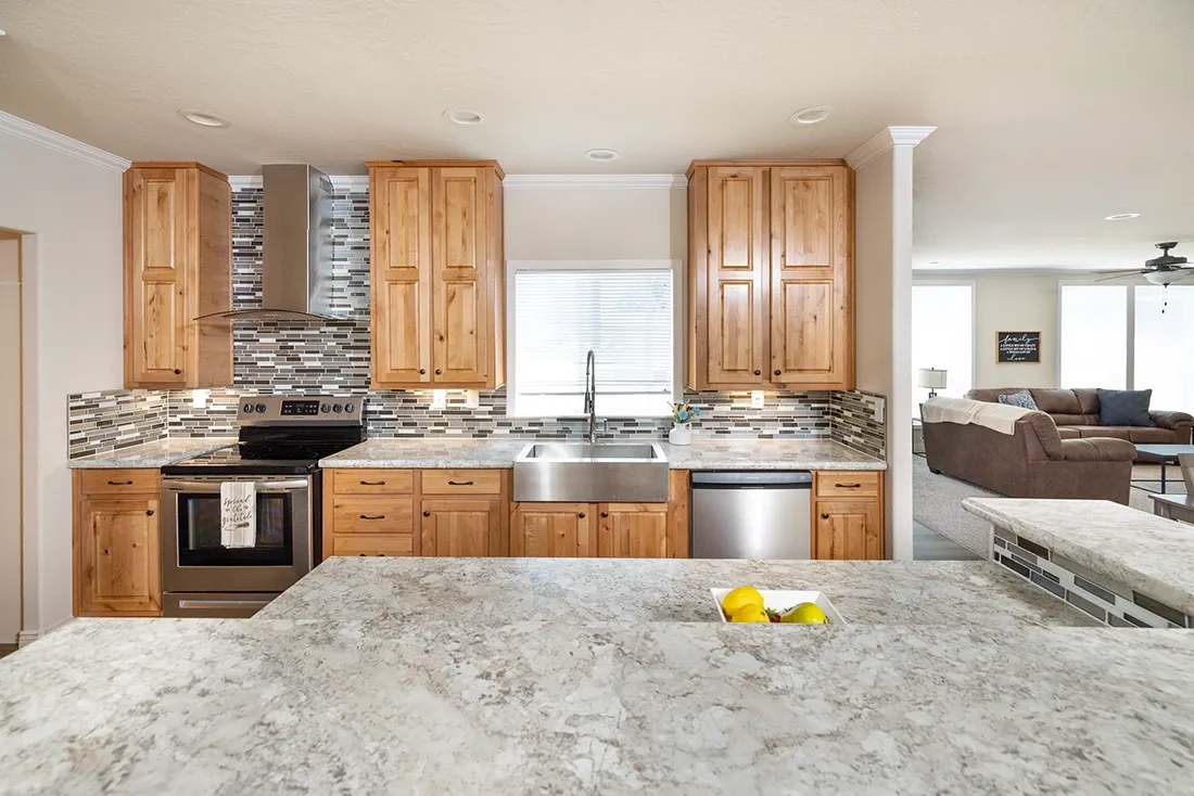 The TH601F                 CLAYTON Kitchen. This Manufactured Mobile Home features 3 bedrooms and 2 baths.