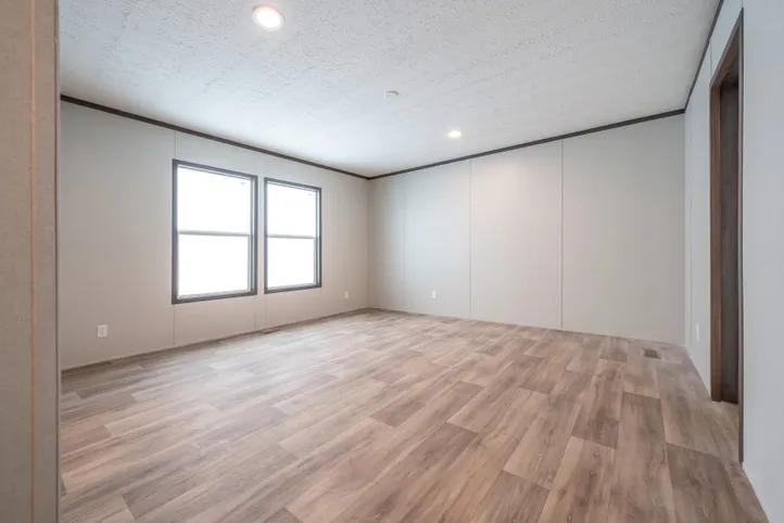 The EMPOWER Bedroom. This Manufactured Mobile Home features 4 bedrooms and 2 baths.