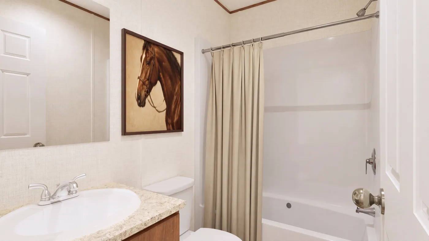 The CYPRESS Guest Bathroom. This Manufactured Mobile Home features 4 bedrooms and 2 baths.