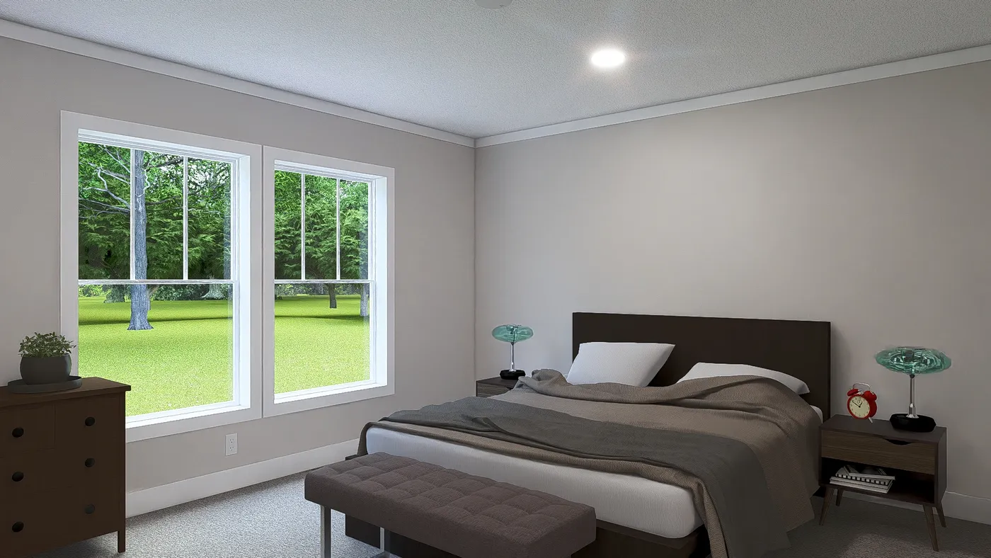 The SHOUT Primary Bedroom. This Manufactured Mobile Home features 3 bedrooms and 2 baths.