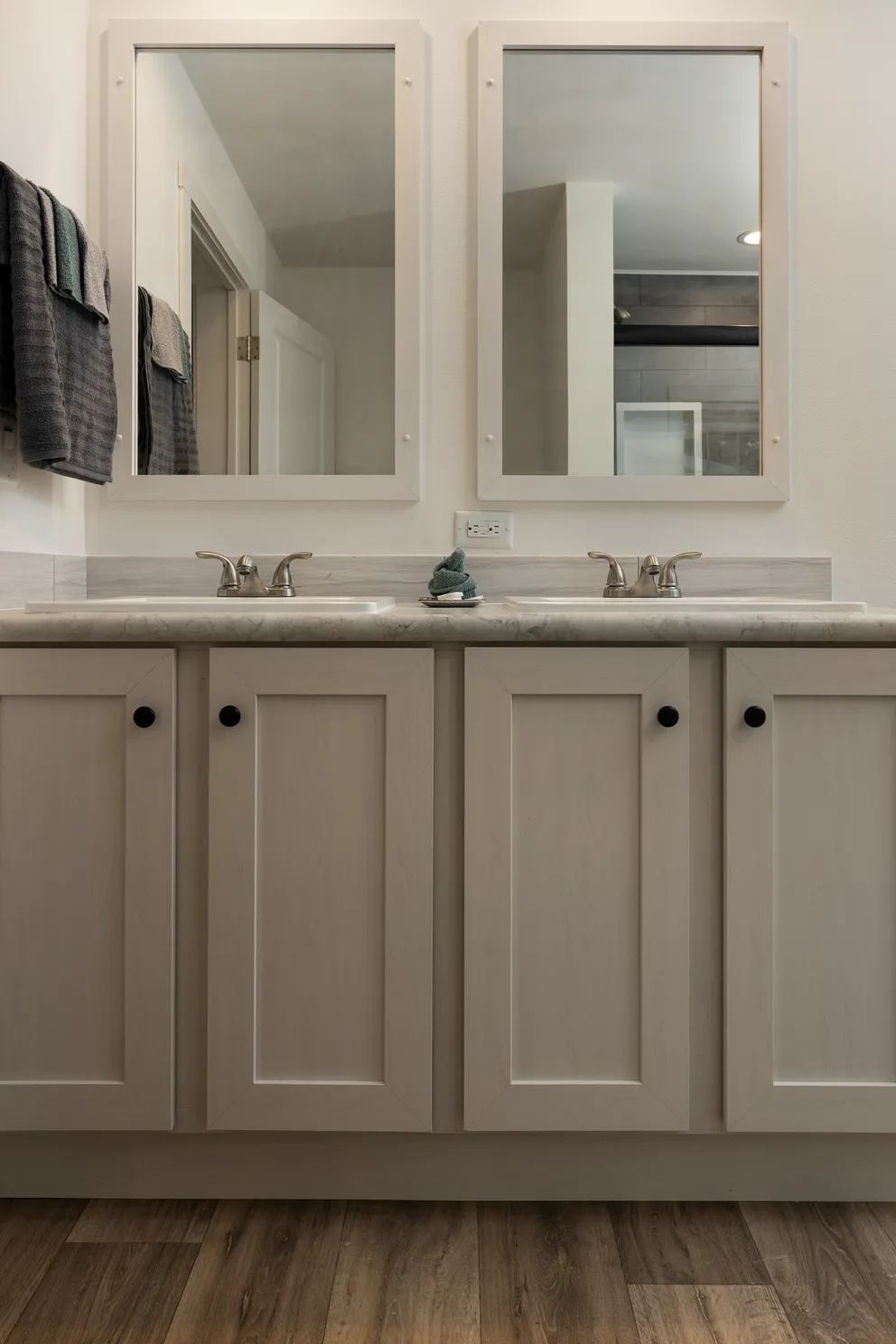 The HEY JUDE Primary Bathroom. This Manufactured Mobile Home features 4 bedrooms and 2 baths.