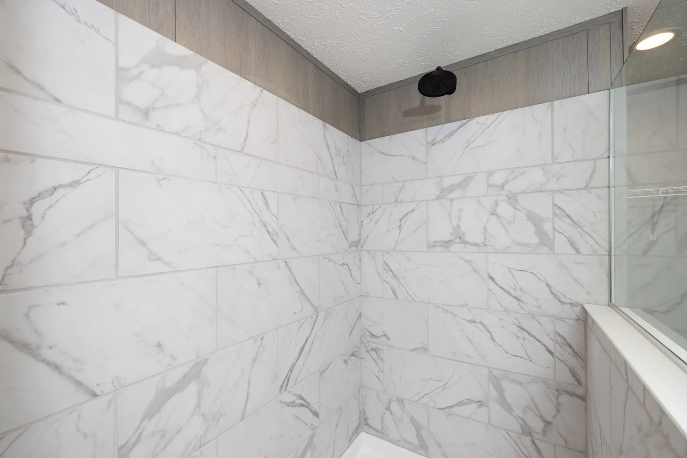The SHOWER HOUSE Primary Bathroom. This Manufactured Mobile Home features 3 bedrooms and 2 baths.