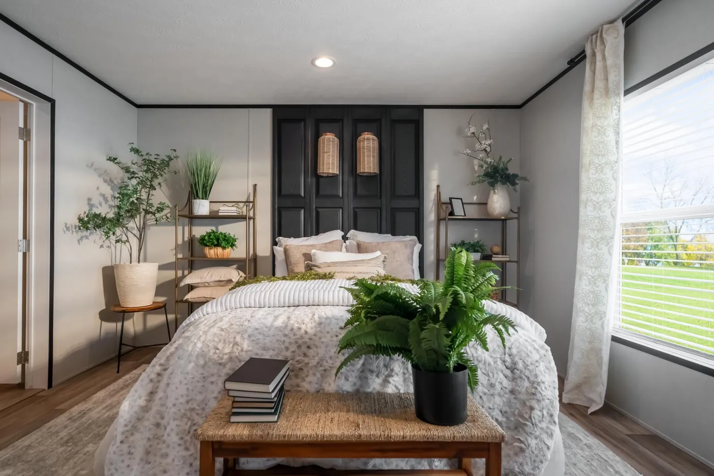 The ELEMENT Primary Bedroom. This Manufactured Mobile Home features 3 bedrooms and 2 baths.