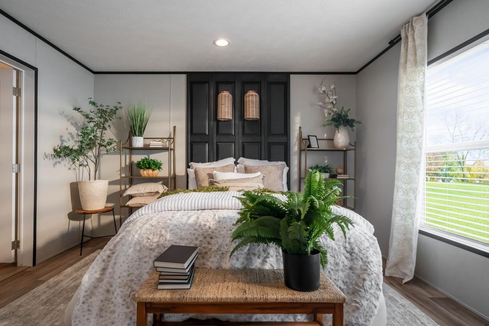 The ELEMENT Primary Bedroom. This Manufactured Mobile Home features 3 bedrooms and 2 baths.