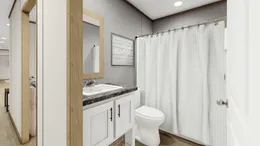 The CLARK 7016-1066 Guest Bathroom. This Manufactured Mobile Home features 3 bedrooms and 2 baths.