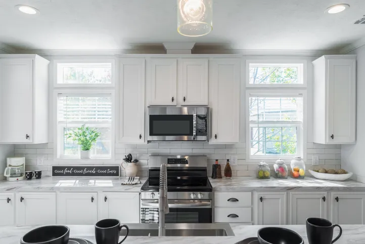 The THE HEWITT Kitchen. This Manufactured Mobile Home features 4 bedrooms and 3 baths.