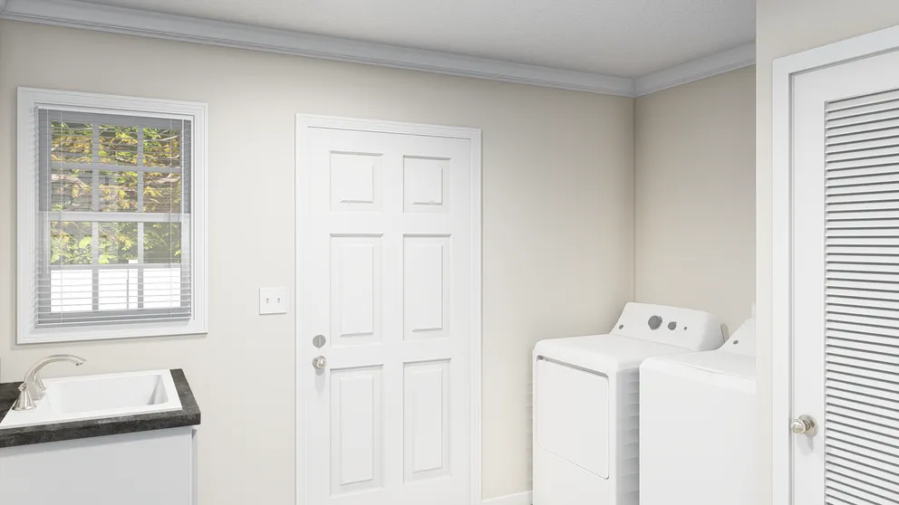 The PALMETTO 6101 Utility Room. This Manufactured Mobile Home features 4 bedrooms and 2.5 baths.