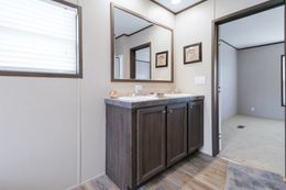 The THE REAL DEAL Primary Bathroom. This Manufactured Mobile Home features 3 bedrooms and 2 baths.