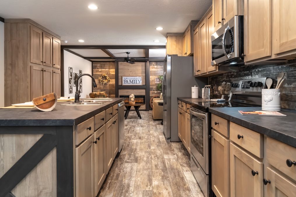The BOUJEE 2 Kitchen. This Manufactured Mobile Home features 3 bedrooms and 2 baths.