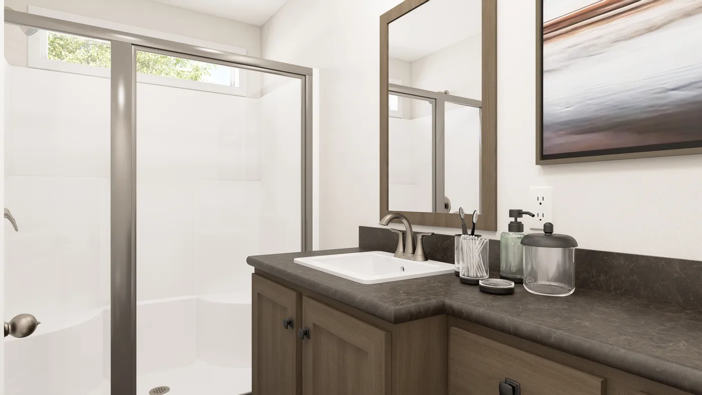 The DRM661N 1566' DREAM Primary Bathroom. This Manufactured Mobile Home features 3 bedrooms and 2 baths.