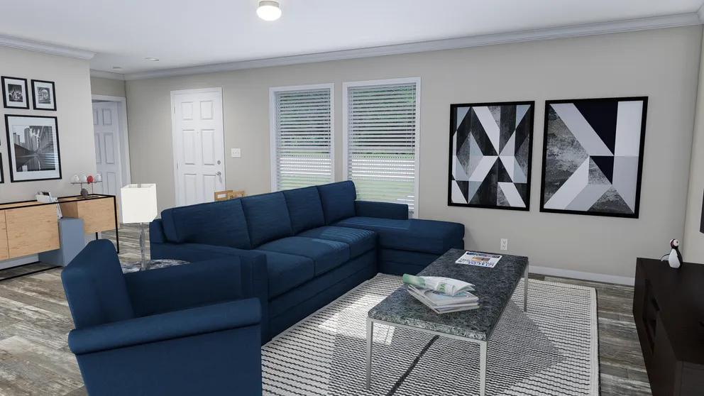 The CAROLINIAN M5000 Living Room. This Manufactured Mobile Home features 3 bedrooms and 2 baths.
