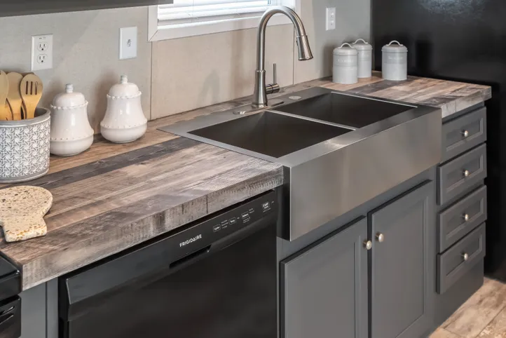 The ANNIVERSARY CHOICE Kitchen. This Manufactured Mobile Home features 3 bedrooms and 2 baths.