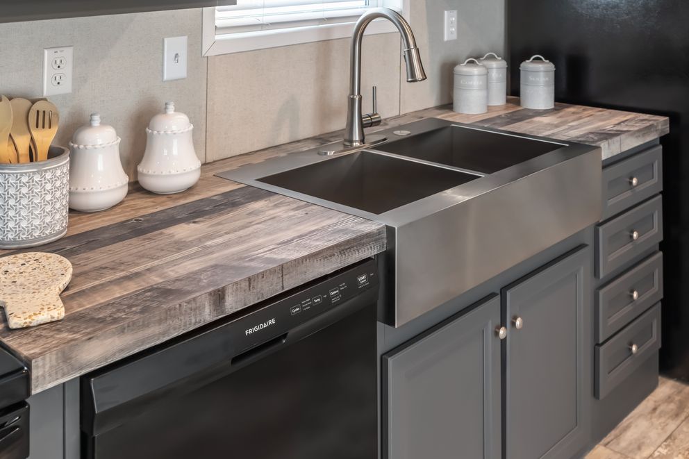 The ANNIVERSARY CHOICE Kitchen. This Manufactured Mobile Home features 3 bedrooms and 2 baths.