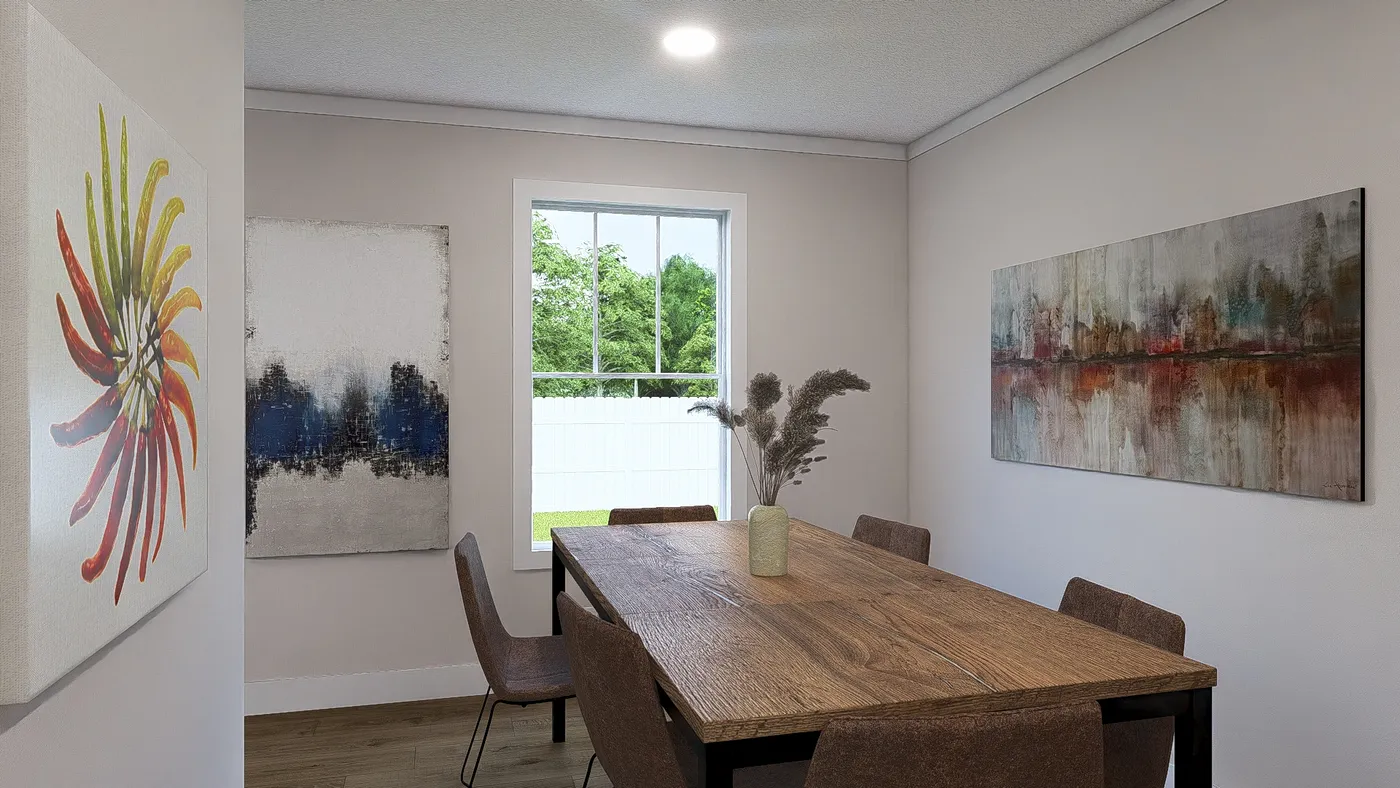 The HEY JUDE Dining Area. This Manufactured Mobile Home features 4 bedrooms and 2 baths.