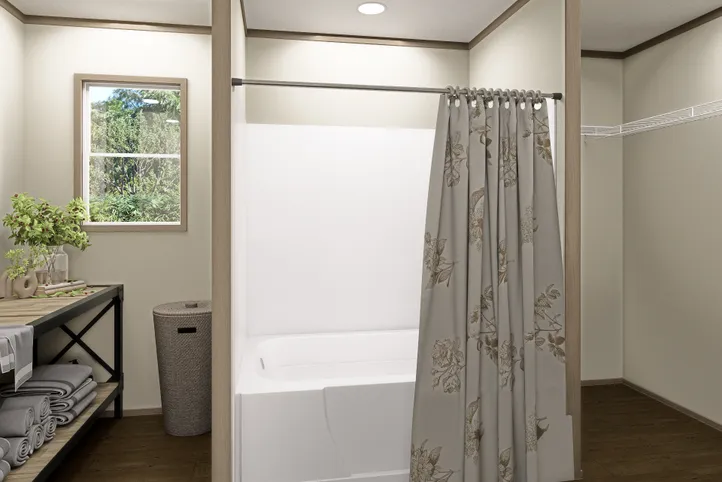 The RAINIER Primary Bathroom. This Manufactured Mobile Home features 4 bedrooms and 3 baths.