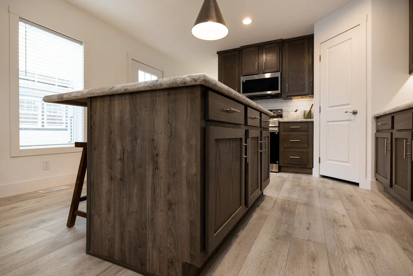 The RAMSEY 217-1 Kitchen. This Manufactured Mobile Home features 3 bedrooms and 2 baths.