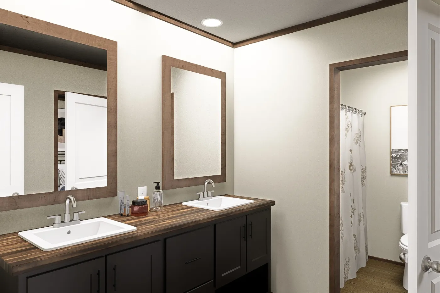 The SNOWCAP Guest Bathroom. This Manufactured Mobile Home features 4 bedrooms and 3 baths.