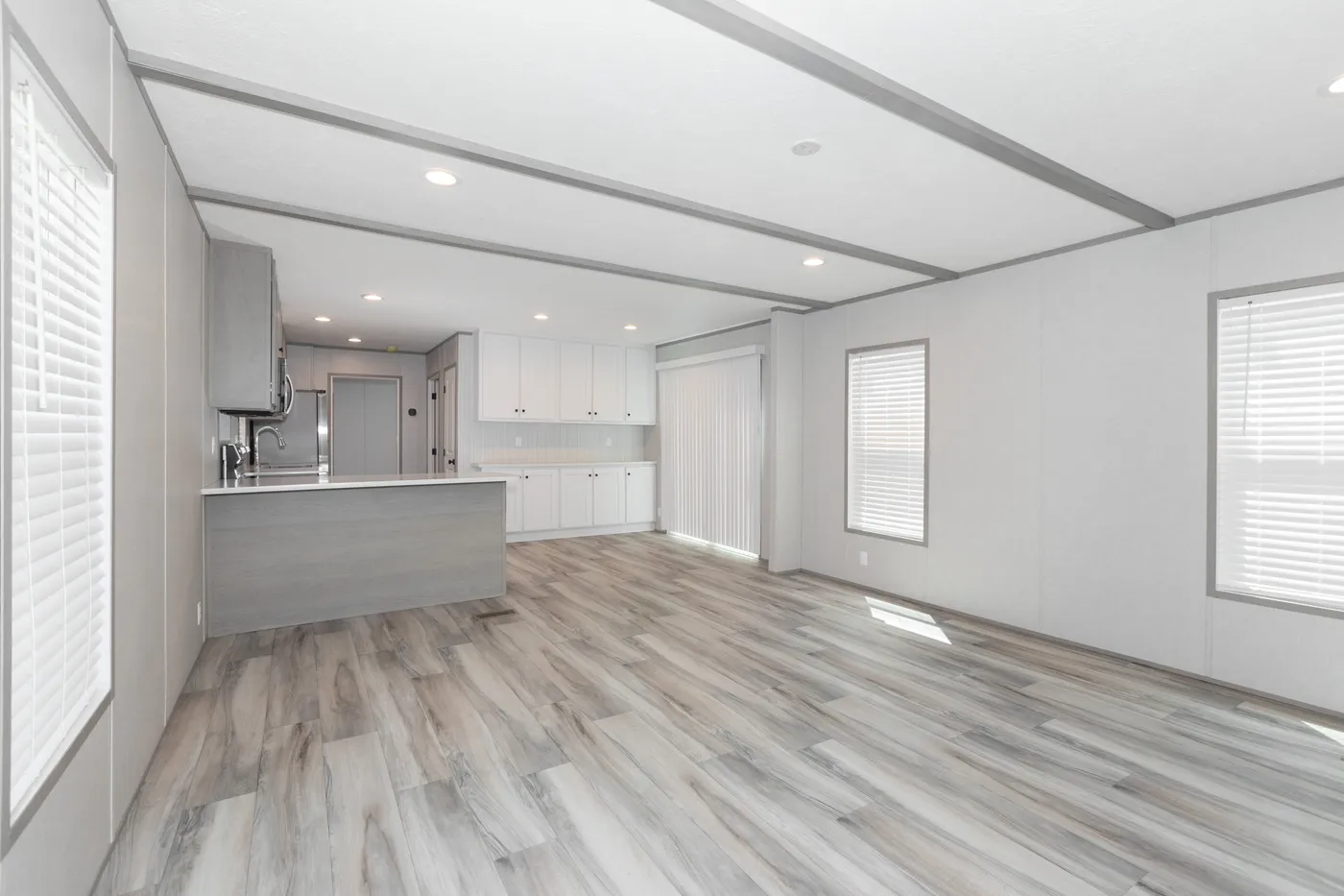The THE ANNIVERSARY 76 Living Room. This Manufactured Mobile Home features 3 bedrooms and 2 baths.