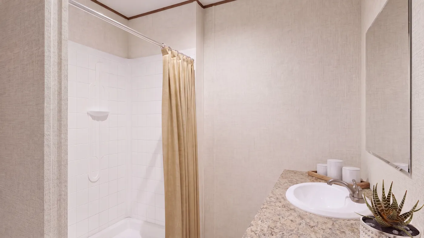 The CEDAR Primary Bathroom. This Manufactured Mobile Home features 3 bedrooms and 2 baths.