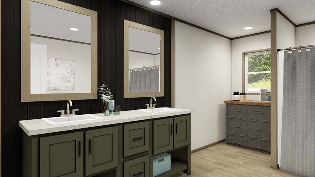 The EVEREST Primary Bathroom. This Manufactured Mobile Home features 4 bedrooms and 2 baths.