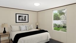 The SPECTACULAR Primary Bedroom. This Manufactured Mobile Home features 3 bedrooms and 2 baths.