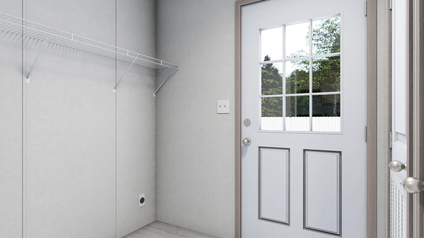 The 6614-4701 THE PULSE Utility Room. This Manufactured Mobile Home features 3 bedrooms and 2 baths.