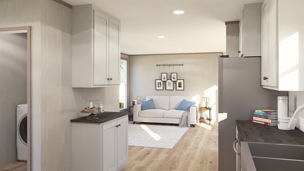 The ULTRA A-PLUS 16X76 Kitchen. This Manufactured Mobile Home features 3 bedrooms and 2 baths.