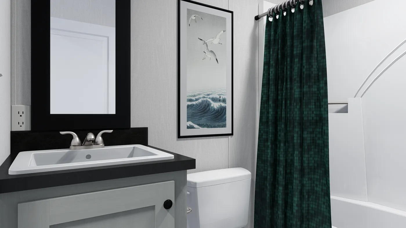 The 7616-4791 THE PULSE Guest Bathroom. This Manufactured Mobile Home features 3 bedrooms and 2 baths.