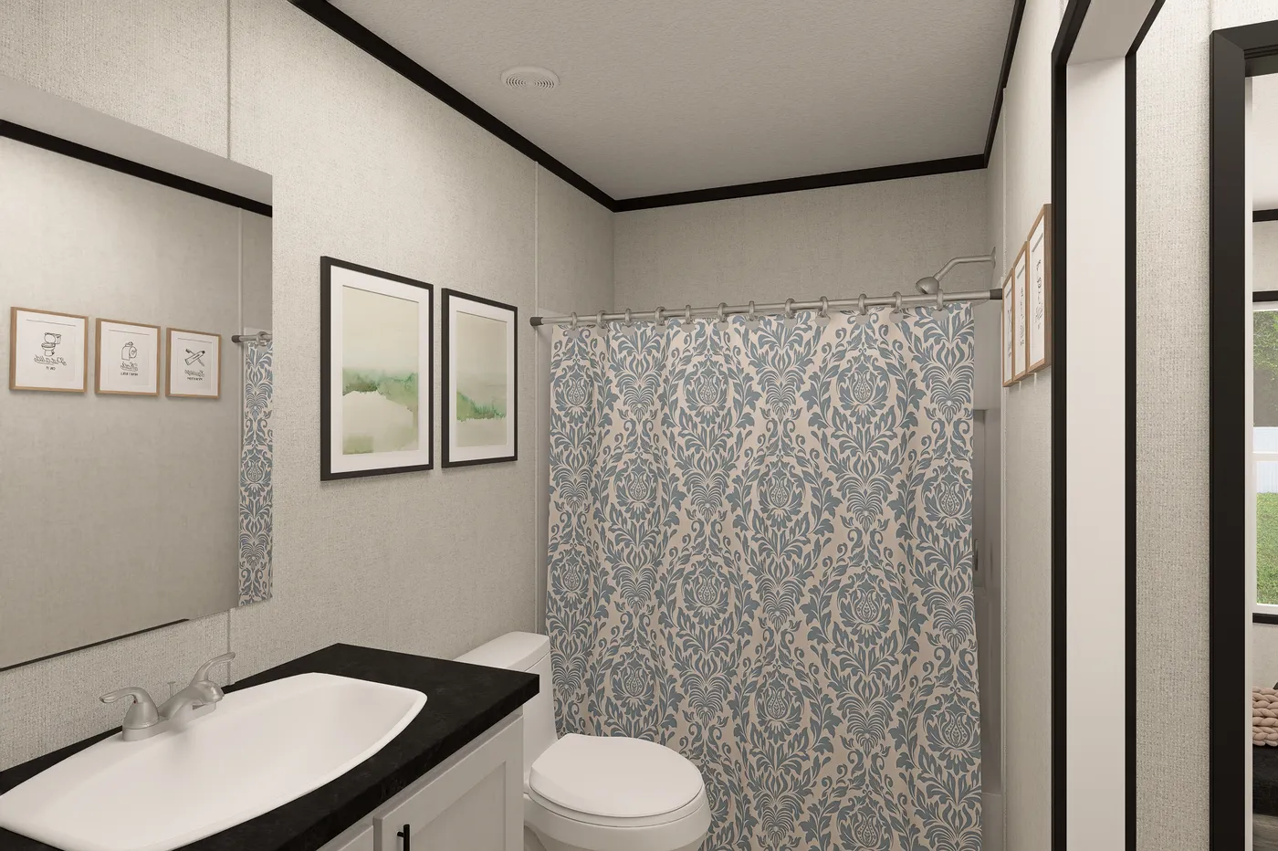 The THE MOUNTAINEER 48 Guest Bathroom. This Manufactured Mobile Home features 3 bedrooms and 2 baths.