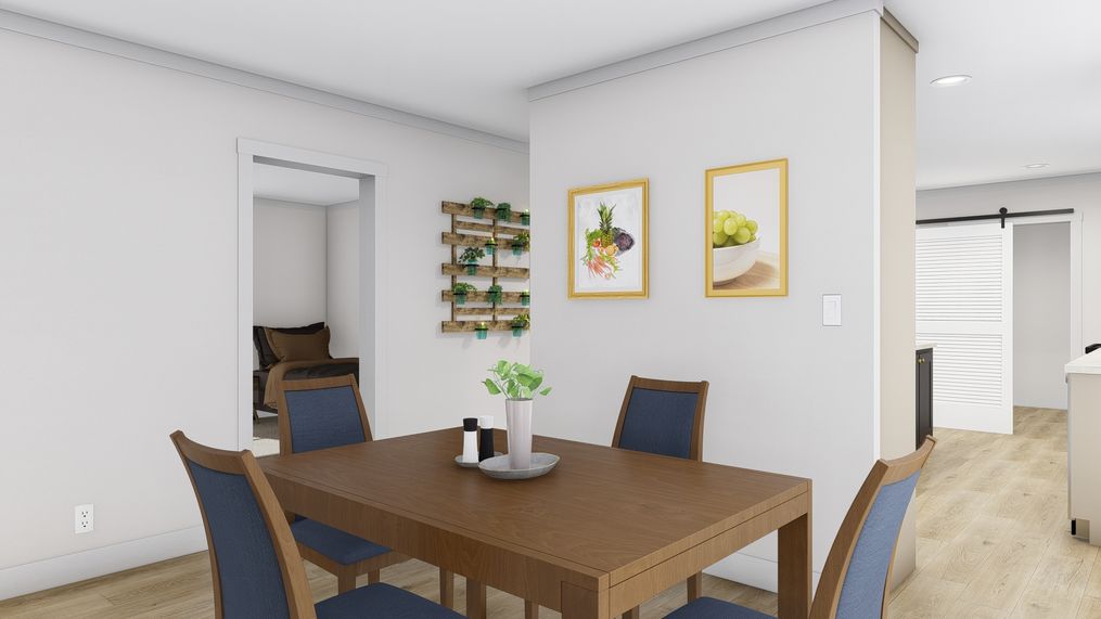 The LET IT BE Dining Room. This Modular Home features 3 bedrooms and 2 baths.