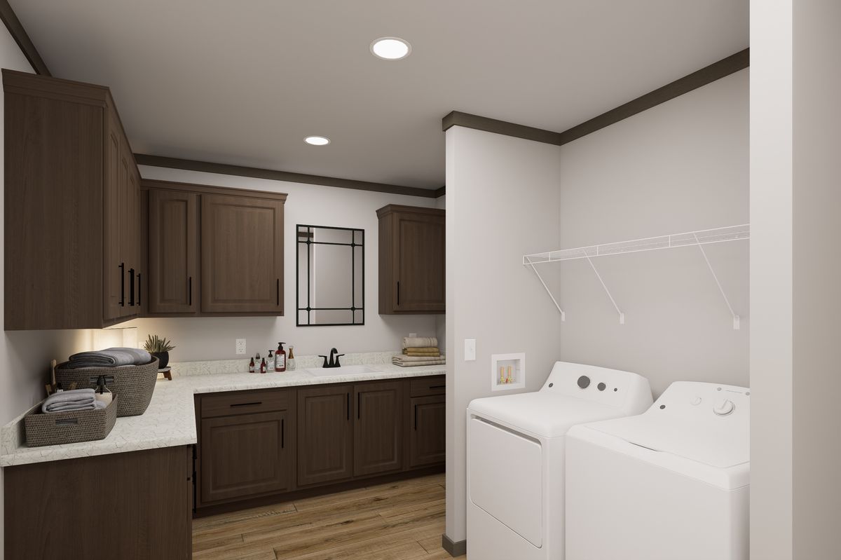 The EASY LIVIN' Utility Room. This Manufactured Mobile Home features 3 bedrooms and 2 baths.