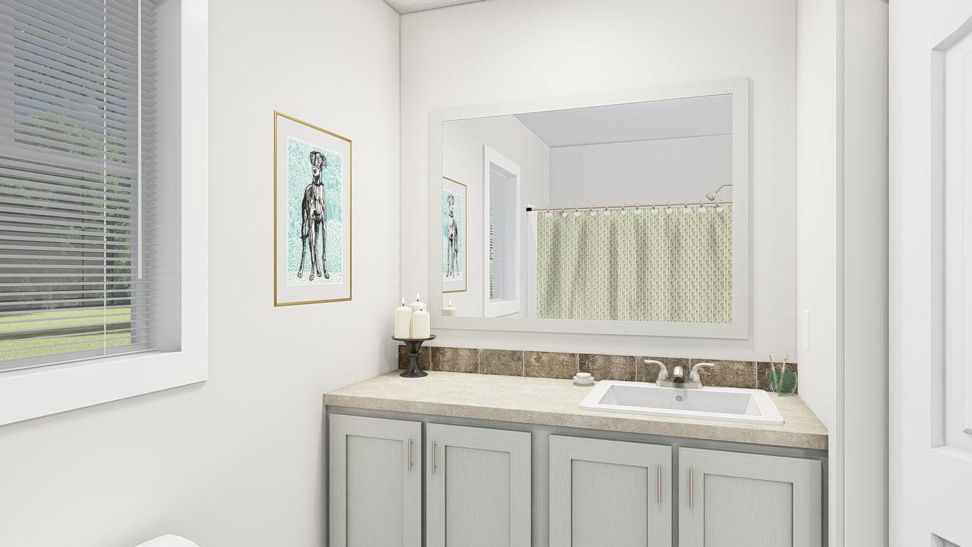 The RAMSEY 207-1 Primary Bathroom. This Manufactured Mobile Home features 3 bedrooms and 2 baths.