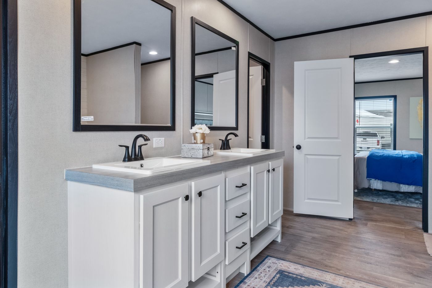 The HERCULES Primary Bathroom. This Manufactured Mobile Home features 4 bedrooms and 2 baths.