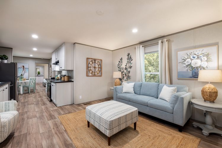 The NORTHSTAR Living Room. This Manufactured Mobile Home features 3 bedrooms and 2 baths.