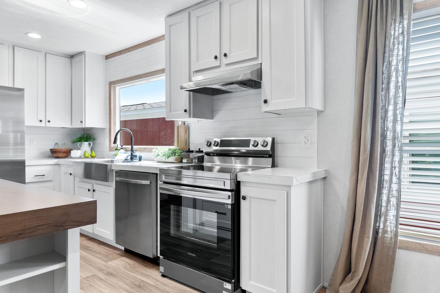 The THE REAL DEAL Kitchen. This Manufactured Mobile Home features 3 bedrooms and 2 baths.