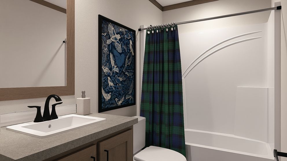 The ISABELLA Guest Bathroom. This Manufactured Mobile Home features 3 bedrooms and 2 baths.