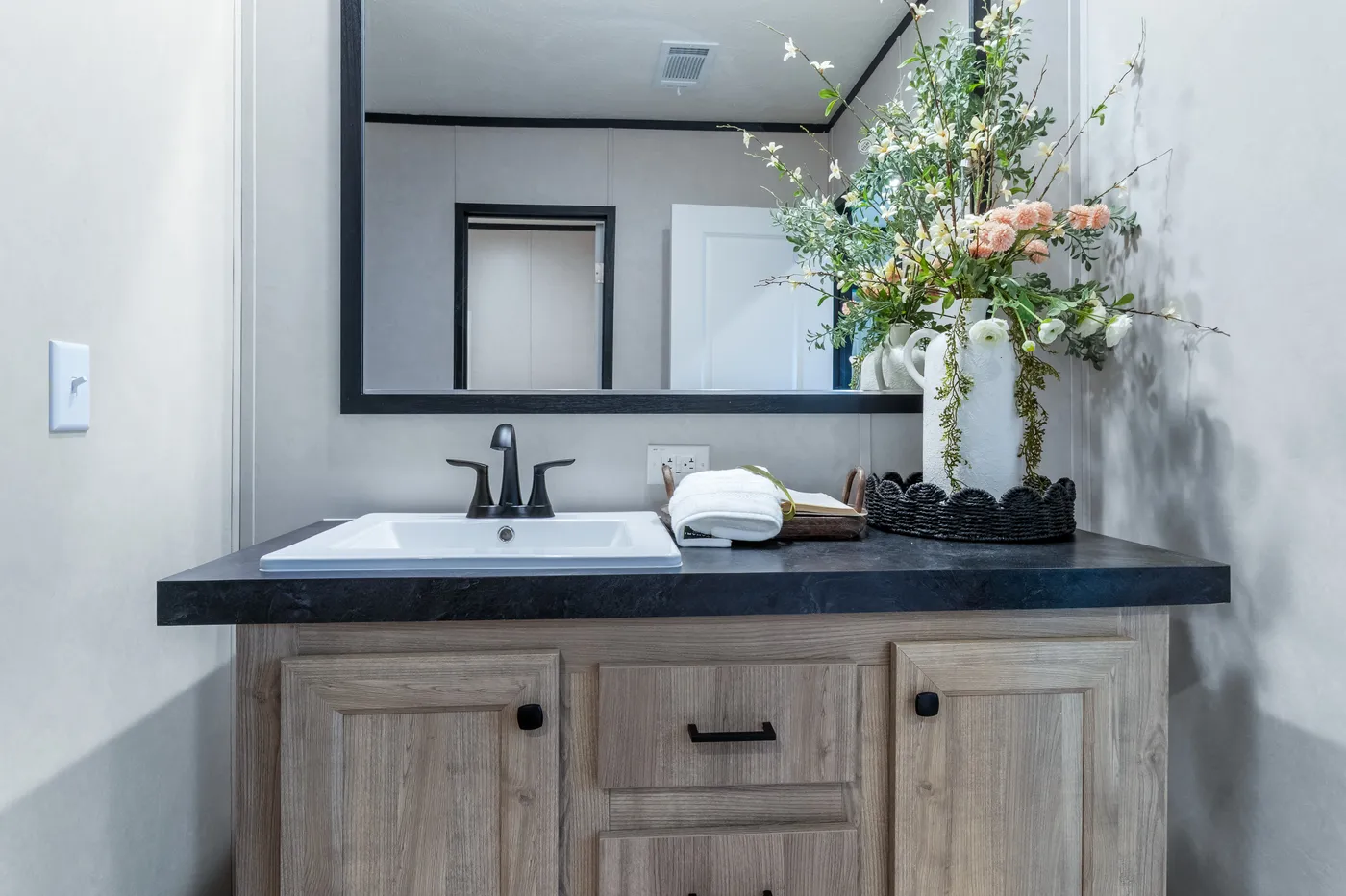 The ODYSSEY Guest Bathroom. This Manufactured Mobile Home features 4 bedrooms and 2 baths.