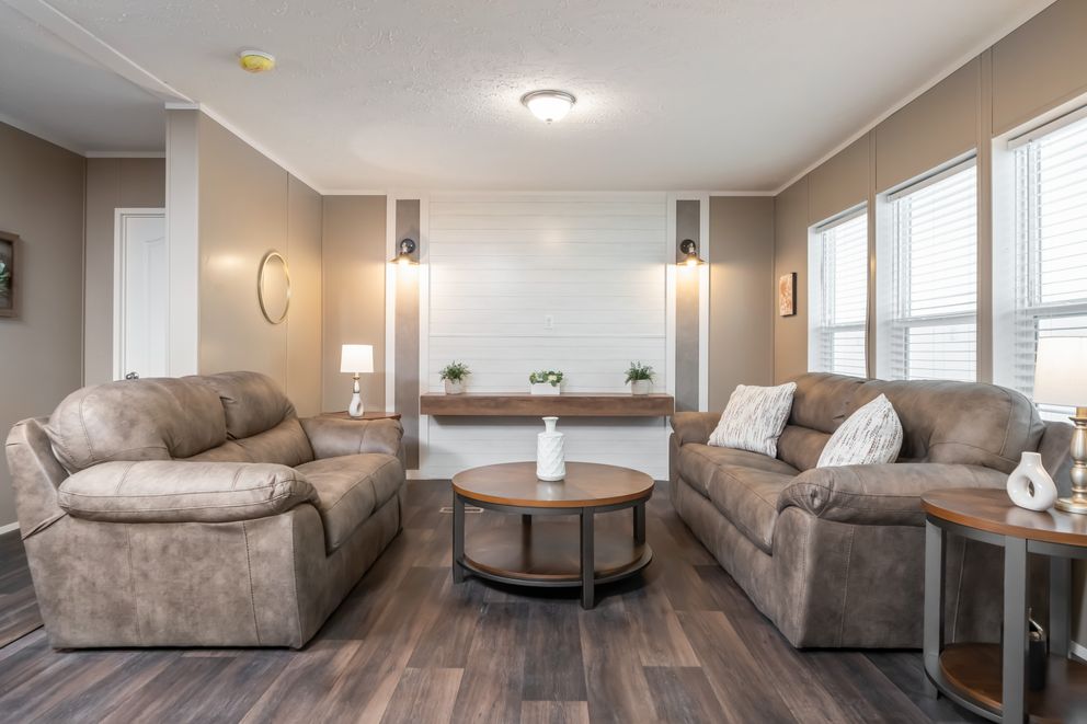 The ISLAND BREEZE 64 Living Room. This Manufactured Mobile Home features 4 bedrooms and 2 baths.