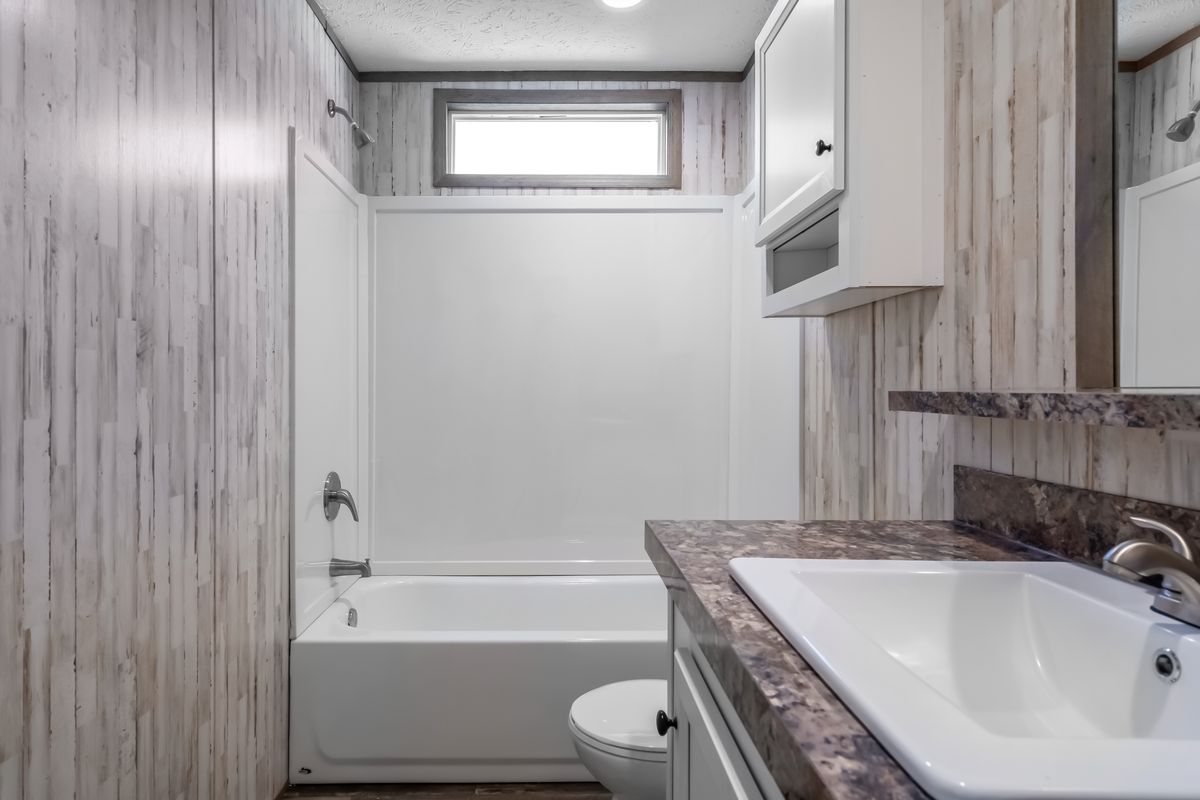 The NUMBER ONE Exterior. This Manufactured Mobile Home features 3 bedrooms and 2 baths.