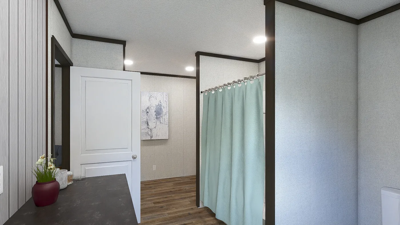 The ESSENCE Primary Bathroom. This Manufactured Mobile Home features 3 bedrooms and 2 baths.