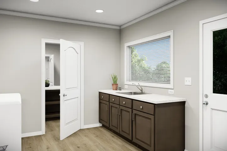 The HUXTON II Utility Room. This Manufactured Mobile Home features 4 bedrooms and 2 baths.