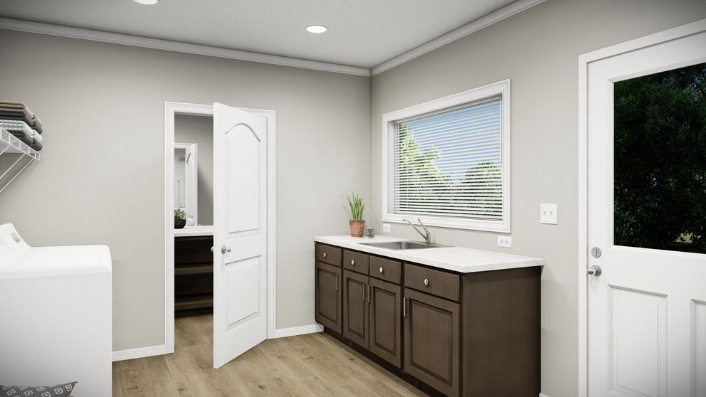 The HUXTON II Utility Room. This Manufactured Mobile Home features 4 bedrooms and 2 baths.