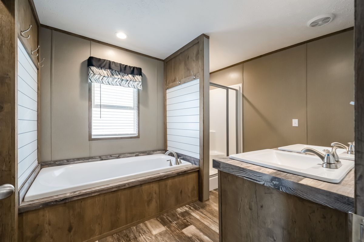 The PEYTON Exterior. This Manufactured Mobile Home features 3 bedrooms and 2 baths.