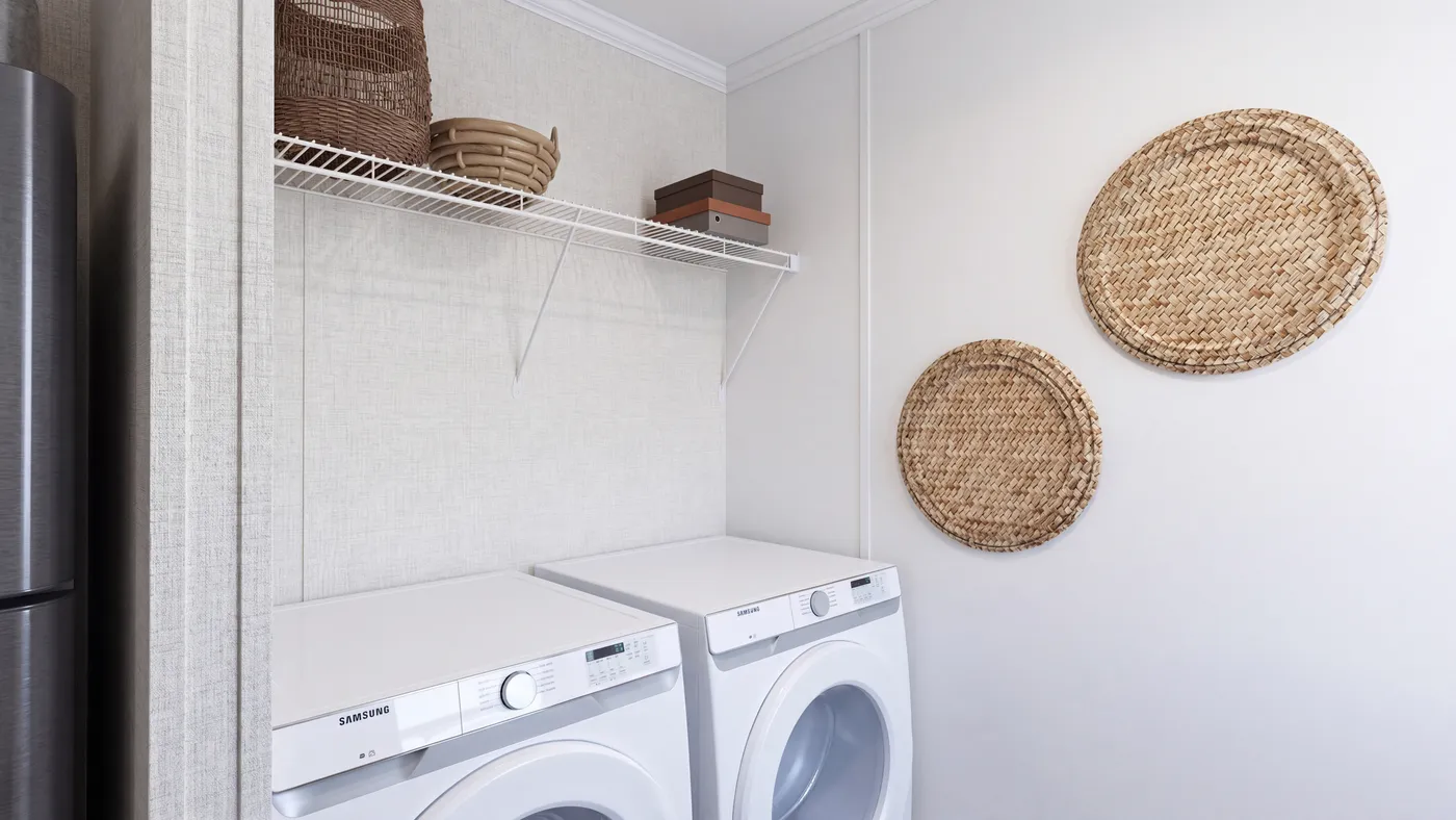 The DOGWOOD Utility Room. This Manufactured Mobile Home features 2 bedrooms and 2 baths.