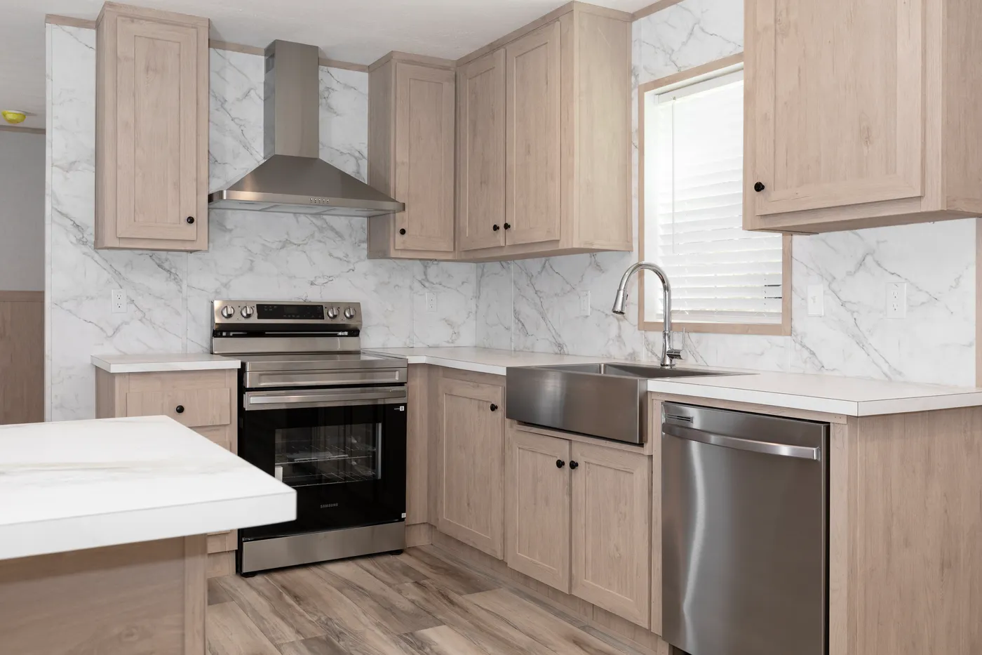 The THE THUNDERHEAD Kitchen. This Manufactured Mobile Home features 3 bedrooms and 2 baths.