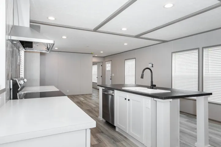 The PLATINUM ANNIVERSARY Kitchen. This Manufactured Mobile Home features 3 bedrooms and 2 baths.
