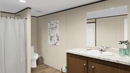 The THRILL Guest Bathroom. This Manufactured Mobile Home features 3 bedrooms and 2 baths.