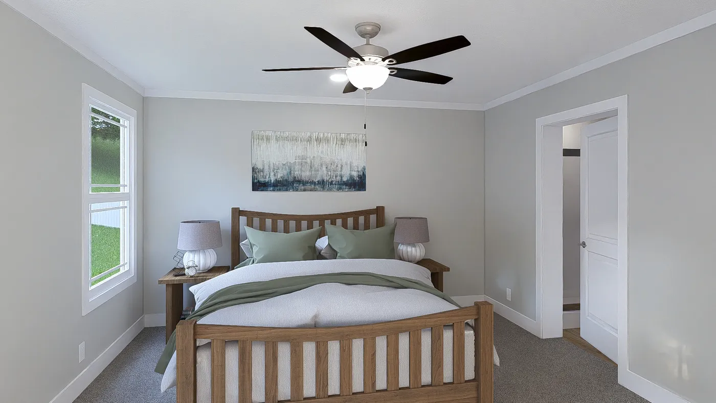 The THE BREEZE 64 Primary Bedroom. This Manufactured Mobile Home features 4 bedrooms and 2 baths.